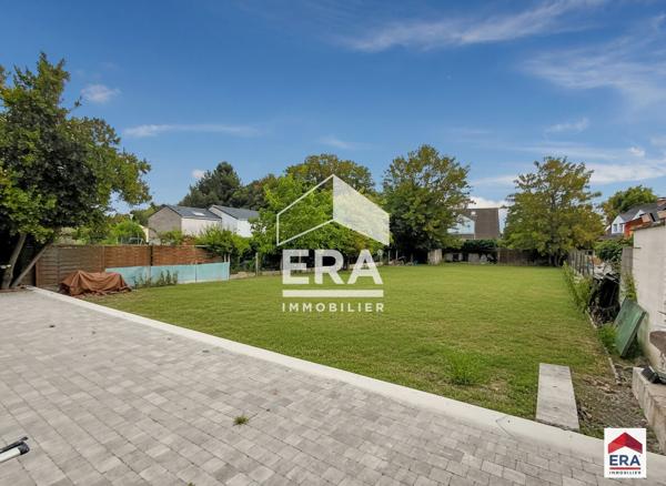 Maison semi plein pied - 175 m² - Jardin - Garage double - Lys-Lez-Lannoy