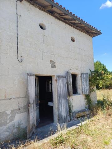 Maison ancienne et terrain constructible