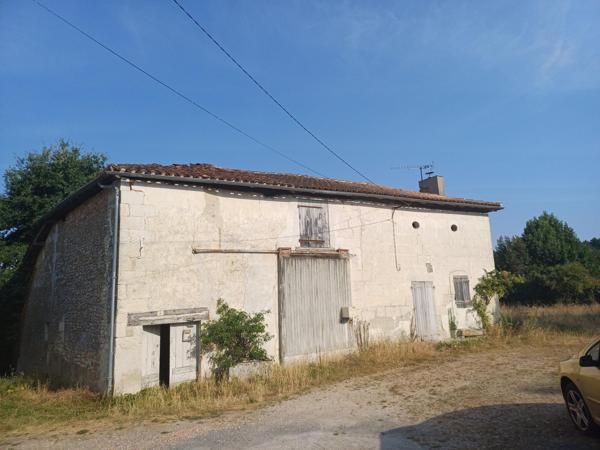 Maison ancienne et terrain constructible