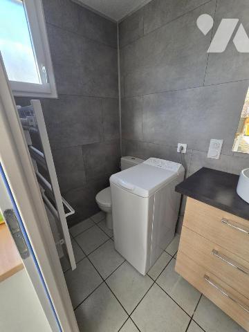 Maison d'habitation avec jardin attenant.