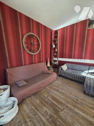 Maison d'habitation avec jardin attenant.