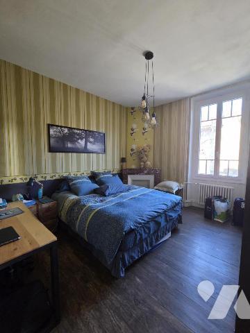 Maison d'habitation avec jardin attenant.