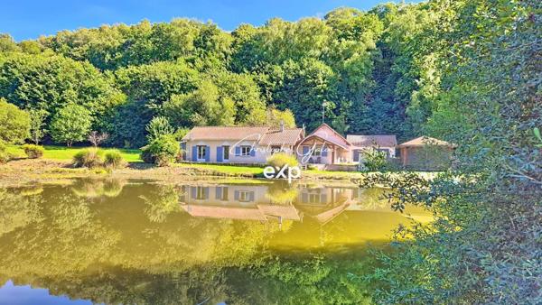 Maison de plain-pied avec étang et terrain de plus d’un hectare
