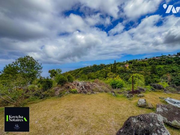 LA MONTAGNE Terrain constructible de 2 645m² en zone Uh avec une vue exceptionnelle