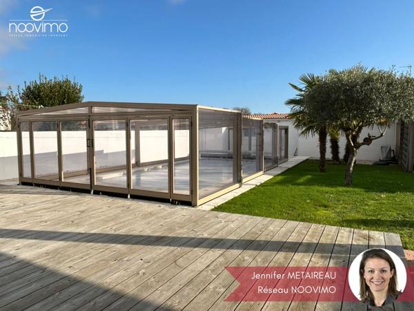 Maison 2 chambres avec double garage et piscine sur parcelle de 540 m²