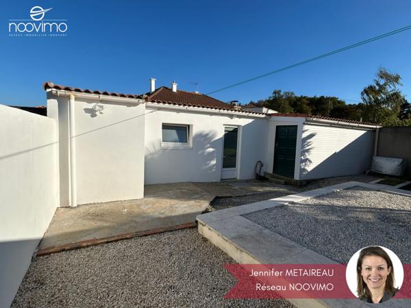 Maison 2 chambres avec double garage et piscine sur parcelle de 540 m²