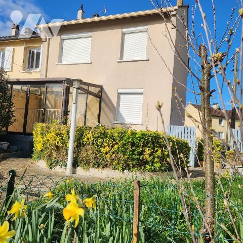 Maison familiale avec garage, jardin clos et véranda