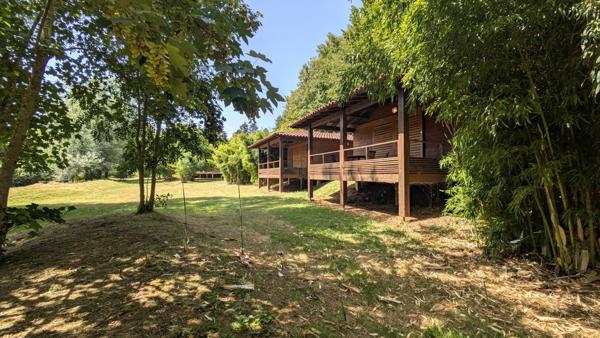 Complexe de loisirs avec 9 chalets -  27 pièce(s) - 315 m2