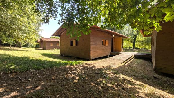 Complexe de loisirs avec 9 chalets -  27 pièce(s) - 315 m2