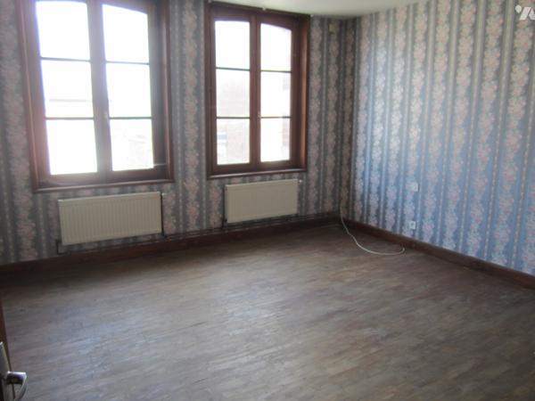 Ensemble immobilier à usage mixte professionnel et habitation mitoyenne