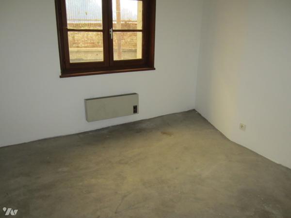 Ensemble immobilier à usage mixte professionnel et habitation mitoyenne