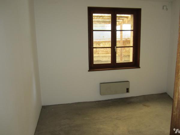 Ensemble immobilier à usage mixte professionnel et habitation mitoyenne