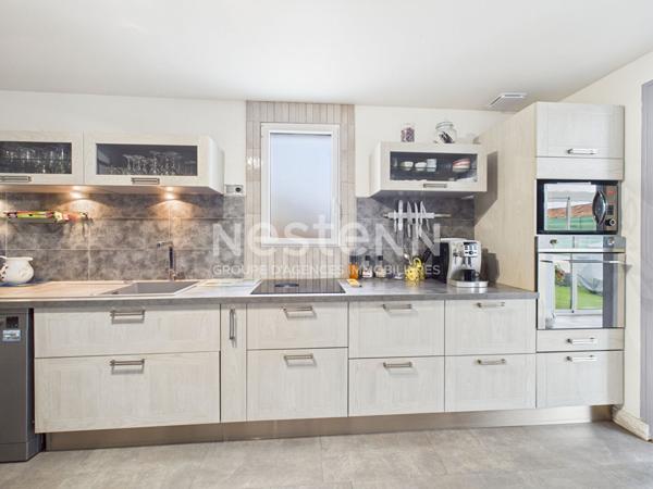 A Aurillac, quartier la Ponétie, à Vendre Maison de type 6, mitoyenne, d'une surface de 129 m².