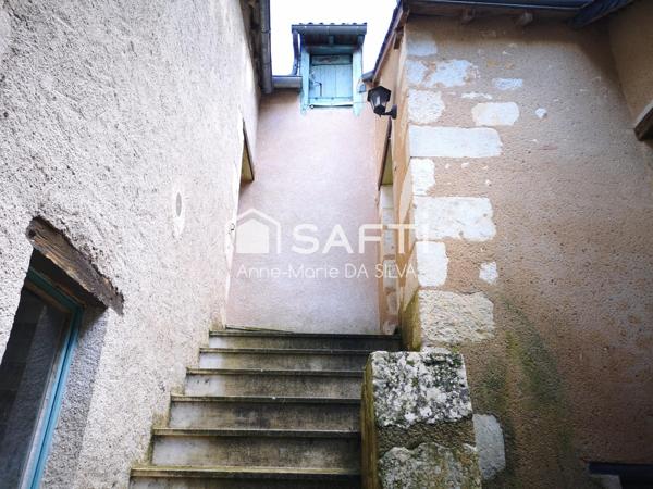 Maison divisée en 2 appartements