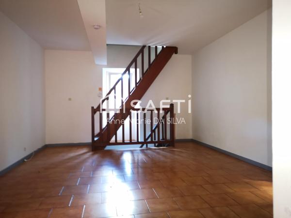 Maison divisée en 2 appartements