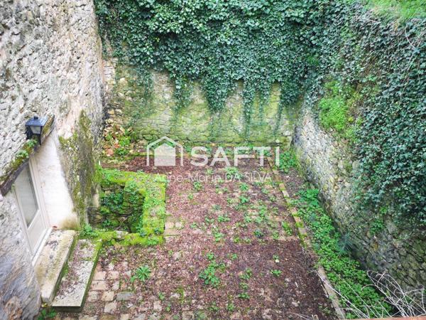 Maison divisée en 2 appartements