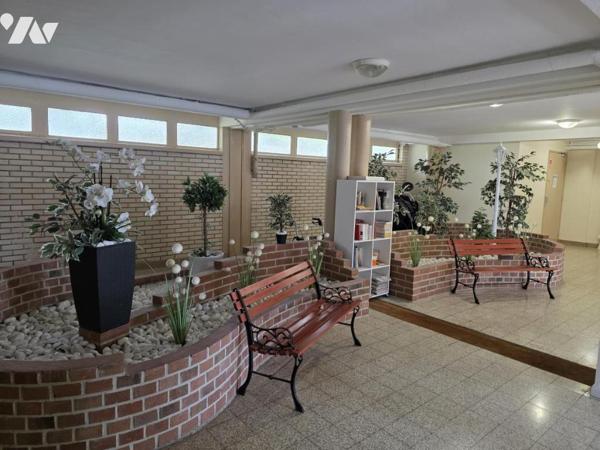 Appartement de type 3 en résidence sécurisée avec parking et balcon 