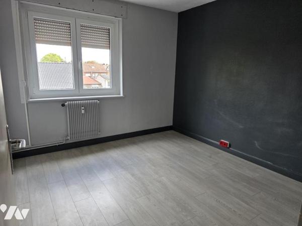 Appartement de type 3 en résidence sécurisée avec parking et balcon 