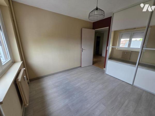 Appartement de type 3 en résidence sécurisée avec parking et balcon 