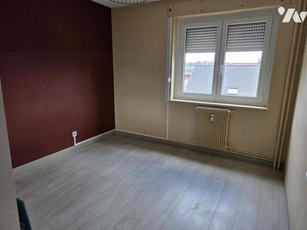 Appartement de type 3 en résidence sécurisée avec parking et balcon 