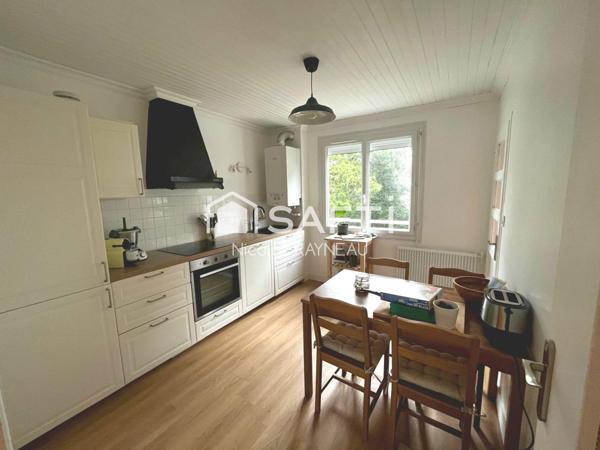 Appartement sans travaux avec 3 chambres, garage et cave.