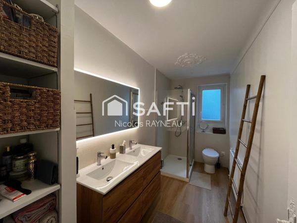 Appartement sans travaux avec 3 chambres, garage et cave.