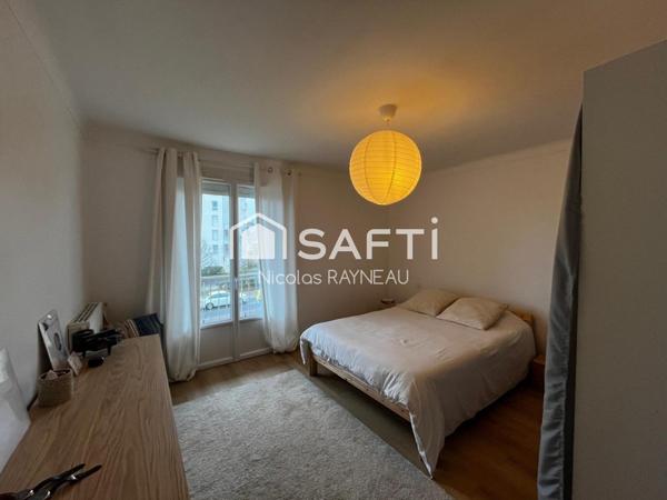 Appartement sans travaux avec 3 chambres, garage et cave.