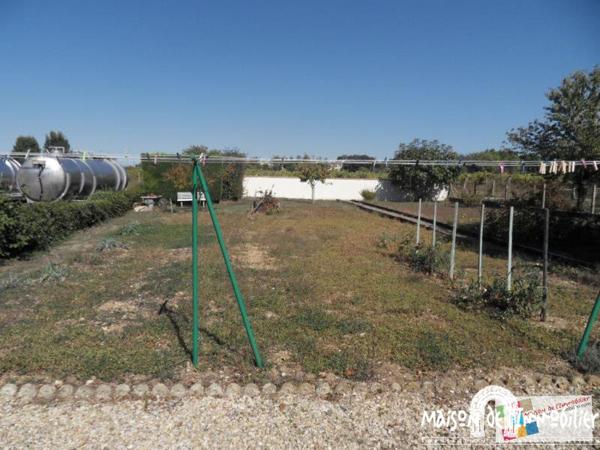 Vente Maison de plain-pied - 4 pièces - 84m² - Jardin de 1100m² - BOUTIERS SAINT TROJAN