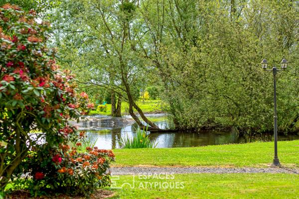 Propriété avec piscine à proximité dans le cadre bucolique du Marais Vernier