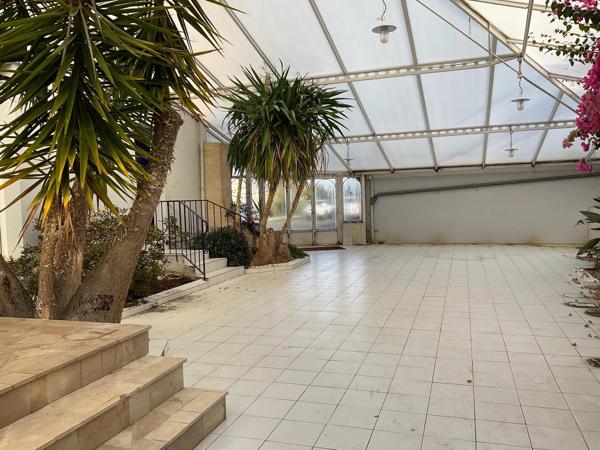 Appartement, Rez de jardin avec jardin d'hiver