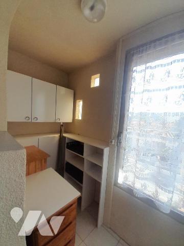Appartement T3/4 avec balcon , cellier et garage  situé au 2eme étage d'un immeuble 