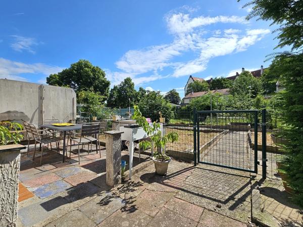 Maison mitoyenne au calme