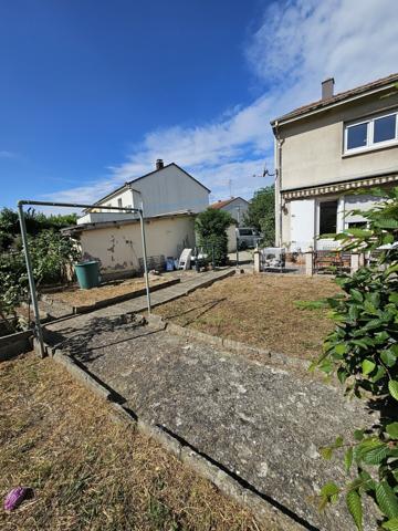 Maison mitoyenne au calme