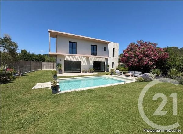 Maison à vendre  4 pièces - 143 m 2   MOUGINS  - 06