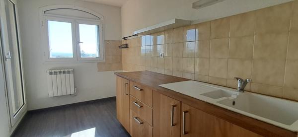Appartement de T2 vendu loué avec balcon dans résidence avec ascenseur - Castelnaudary (11400)