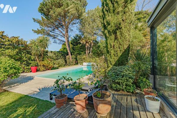 PROPRIETE DES ANNEES 80 EDIFIEE DANS UN ECRIN DE VERDURE