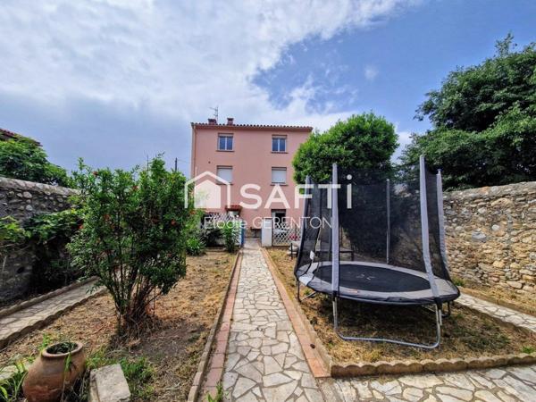 Immeuble de rapport avec garages et jardin