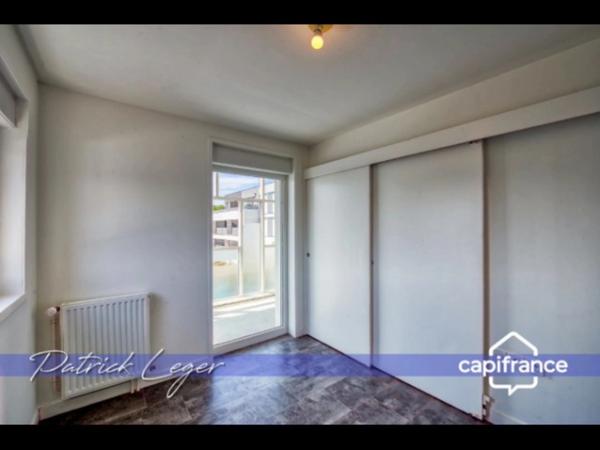 PÉRIGNY (17) – Élégant T3 modulable avec grande terrasse couverte & parking sous-sol