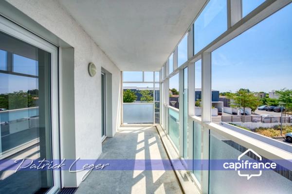 PÉRIGNY (17) – Élégant T3 modulable avec grande terrasse couverte & parking sous-sol