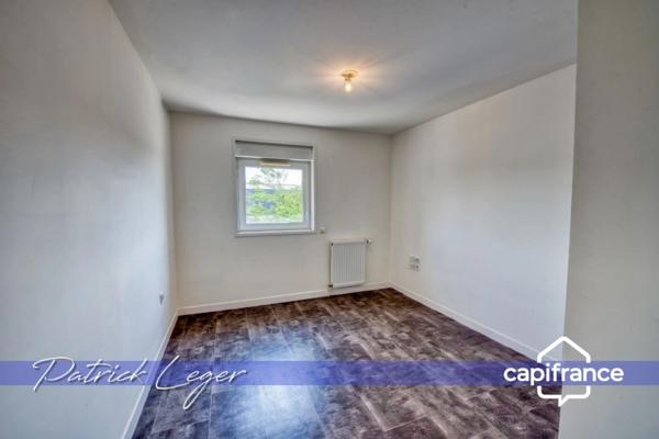 PÉRIGNY (17) – Élégant T3 modulable avec grande terrasse couverte & parking sous-sol