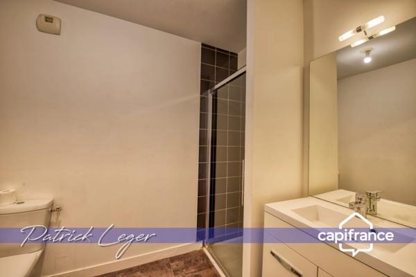 PÉRIGNY (17) – Élégant T3 modulable avec grande terrasse couverte & parking sous-sol