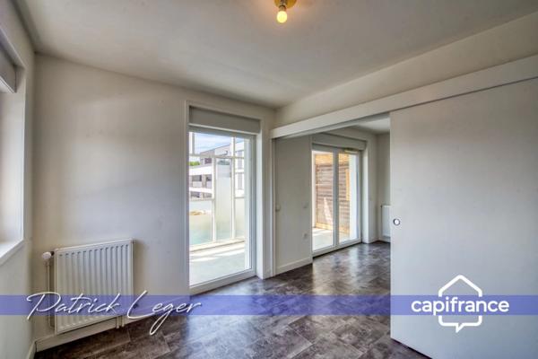 PÉRIGNY (17) – Élégant T3 modulable avec grande terrasse couverte & parking sous-sol