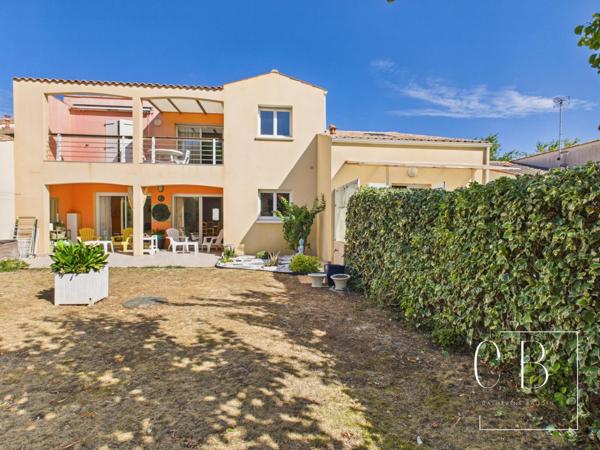 Maison aux trois espaces de vie indépendants