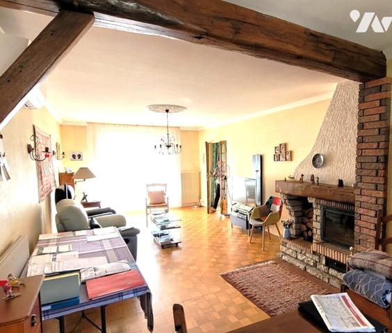 Maison de ville de 130 m² élevée sur sous-sol édifiée sur parcelle de 498 m².