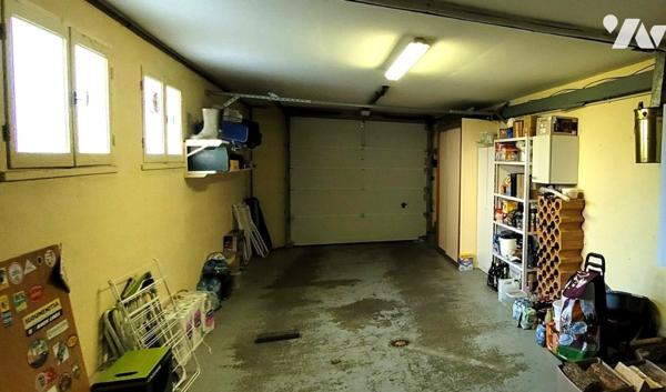 Maison de ville de 130 m² élevée sur sous-sol édifiée sur parcelle de 498 m².