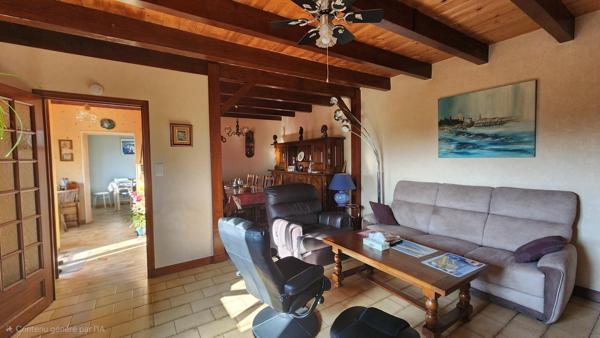 Maison T4 proche des commodités, avec le canal en façade, et un bois exploitable en arrière-plan