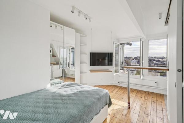 Studio plein ciel au vues sur jardins et monuments parisiens