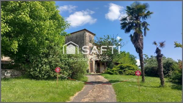 Maison en pierre 201m2, 4chambres, dépendances , parcelle 6ha