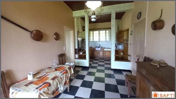 Maison en pierre 201m2, 4chambres, dépendances , parcelle 6ha