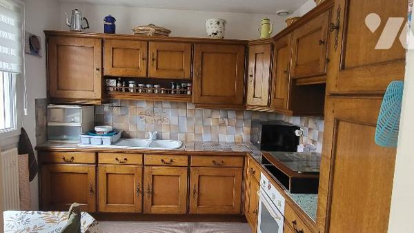 Maison individuelle occupée avec étang